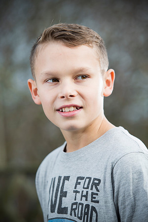 Childrens portrait of young boy oudoors