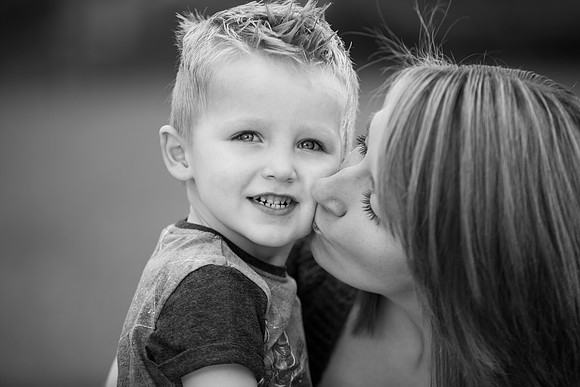 Mum-son-kissing-cheek