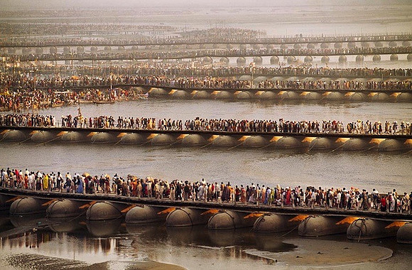 Steve McCurry - Crowds waiting to bathe in the Ganges during Kumbh Mela Festival, 2011